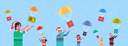 people catching gift present boxes falling down with parachutes merry christmas happy new year holiday celebration concept men women wearing santa hats horizontal portrait vector illustrationのイラスト素材