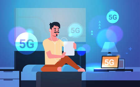 man using tablet listening audio book 5G online communication fifth innovative generation of internet connection guy sitting on bed modern bedroom interior horizontal full length vector illustrationのイラスト素材
