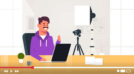 technology blogger recording online video man testing new laptop blogging concept vlogger explaining digital device functional guy sitting at workplace horizontal portrait vector illustrationのイラスト素材
