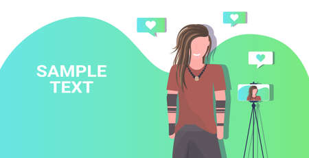 man blogger recording video blog with digital camera or smartphone on tripod live streaming social media blogging concept portrait horizontal copy space vector illustrationのイラスト素材