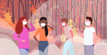mix race people in protective masks wildfire bush fire development dry woods burning trees global...