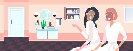 beautiful women applying face masks girls in bathrobes relaxing skincare spa facial treatment concept bathroom interior portrait horizontal vector illustrationのイラスト素材