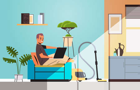 man freelancer using laptop working at home during coronavirus quarantine self-isolation freelance concept living room interior full length horizontal vector illustrationのイラスト素材