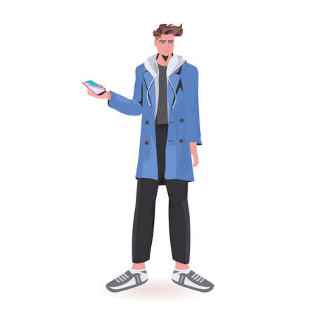 man using smartphone guy model in trendy clothes male cartoon character standing pose full lengthのイラスト素材