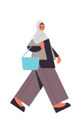 arabic woman walking in traditional clothes arab smiling girl with handbag female cartoon character full length isolated vertical vector illustrationのイラスト素材