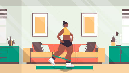 woman doing exercises at home with resistance band girl having workout cardio fitness training healthy lifestyleのイラスト素材