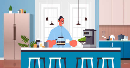 happy man drinking coffee guy relaxing at home cooking concept modern kitchen interiorのイラスト素材