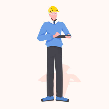 architect builder in helmet using tablet pc civil engineer working at construction site repair...