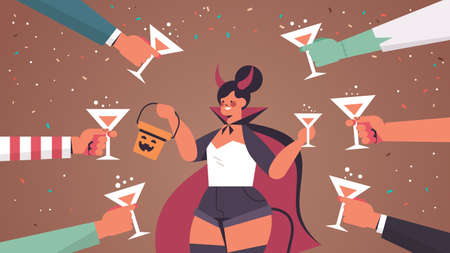 hands holding glasses around woman in devil costume happy halloween party celebration conceptのイラスト素材
