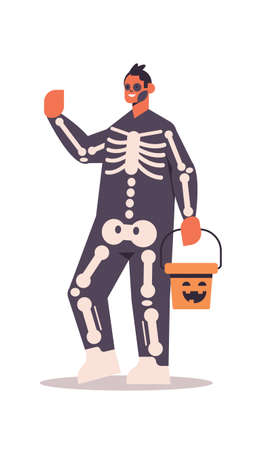 cute man in skeleton costume holding bucket with pumpkin happy halloween party celebration conceptのイラスト素材