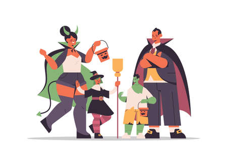 parents and cchildren in different costumes standing together happy halloween party celebration conceptのイラスト素材