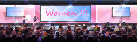 woman making presentation speaking to audience from stage womens club union of feminists concept