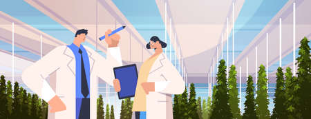 Agricultural engineers researching plants and writing results in tablet smart farm agriculture scientist conceptのイラスト素材