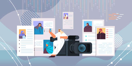 arab hr manager with video camera choosing resume curriculum vitae with photo and personal info