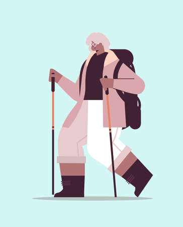 senior woman hiker traveling with backpack and sticks for walk nordic walking active old ageのイラスト素材