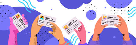 hands holding vaccination record card immunity passports risk free covid-19 pandemic pcr...