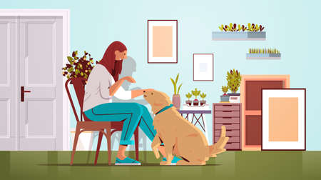 young woman spending time with dog female owner and cute domestic animal friendship with pet conceptのイラスト素材