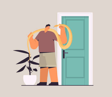man holding yellow python snake guy having dangerous reptile pet horizontal full lengthのイラスト素材