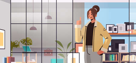 business woman pointing finger up and having new idea brainstorming creativity concept modern office interiorのイラスト素材