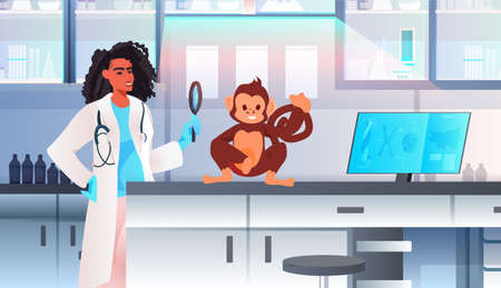 scientist doing experiments in lab woman veterinary worker with experimental monkey biological...
