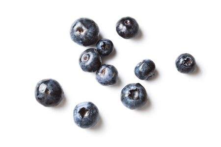 Fresh blueberries scattered and isolated on white backgroundの写真素材