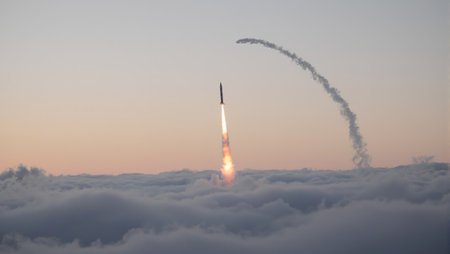 Fiery missile streaks through misty dawn skyの素材