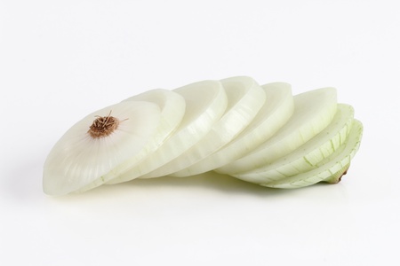 one chopped onion on a white backgroundの写真素材