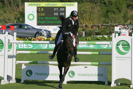 VIMEIRO, PORTUGAL - JUNE 6: Equestrian International Show Jumping 3* - Tim Stockdale (GBR) June 6, 2010 in Vimeiro, Portugalのeditorial素材