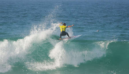PENICHE, PORTUGAL - OCTOBER 12 : Travies Logie (ZAF) in Rip Curl Pro 2010 round 3 October 12, 2010 in Peniche, Portugalのeditorial素材