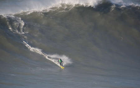 NAZARE, PORTUGAL - NOVEMBER 23 : Team Andrew Cotton/Al Mennie in North Canyon Tow In Trials Round 1 November 23, 2011 in Nazare, Portugalのeditorial素材