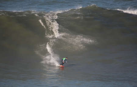 NAZARE, PORTUGAL - NOVEMBER 23 : Team Andrew Cotton/Al Mennie in North Canyon Tow In Trials Round 1 November 23, 2011 in Nazare, Portugalのeditorial素材