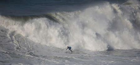 NAZARE, PORTUGAL - NOVEMBER 23 : Team Axi Munian/Pablo Garcia in North Canyon Tow In Trials Round 1 November 23, 2011 in Nazare, Portugalのeditorial素材