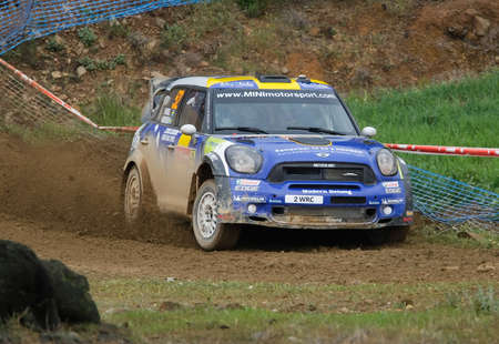 ALGARVE, PORTUGAL - MARCH 31: Patrik Sandell (SWE) driving is Mini Cooper Works WRC in Rally de Portugal 2012 on March 31, 2012 in Algarve, Portugalのeditorial素材