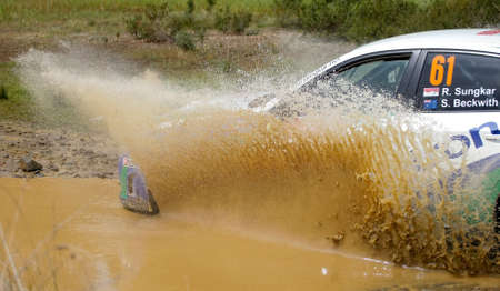 ALGARVE, PORTUGAL - MARCH 31: Rifat Sungkar (IDN) driving is Subaru Impreza in Rally de Portugal 2012 on March 31, 2012 in Algarve, Portugalのeditorial素材