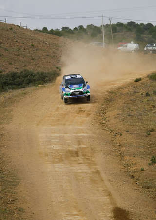 ALGARVE, PORTUGAL - MARCH 31: Petter Solberg (NOR) driving is Ford Fiest RS WRC in Rally de Portugal 2012 on March 31, 2012 in Algarve, Portugalのeditorial素材