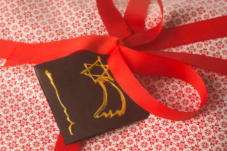 christmas gift with red tapeの写真素材