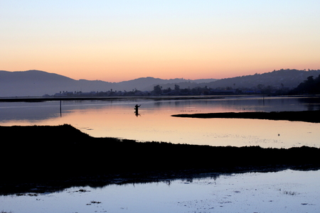 Fisherman At Sunset On Knysna Lagoonの写真素材