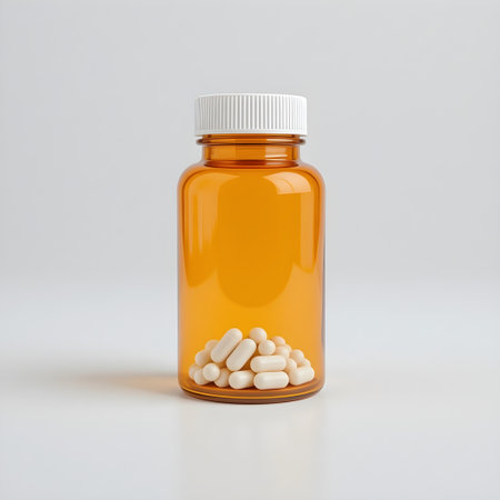 Medical bottle with pills on a white background. 3d rendering.の素材