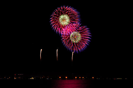 Colorful fireworks display against a dark night sky.
