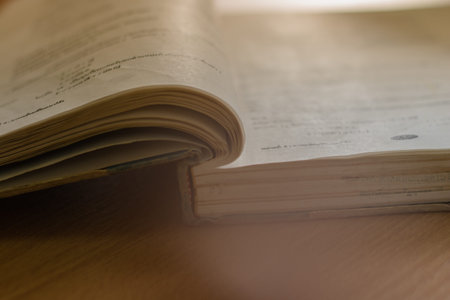 Old books on the table with sun light