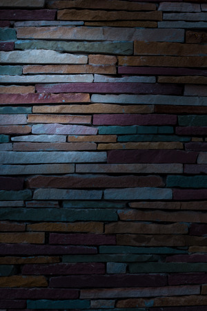 Brick wall colorful abstract dark background,Texture backgroundの写真素材