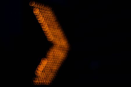 Bokeh traffic symbol evening background, symbol at night defocusの写真素材