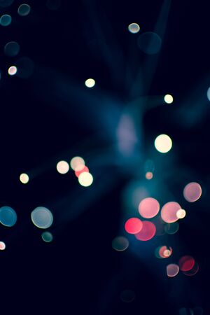Colorful bokeh light celebrate at night, defocus light abstract background.の写真素材