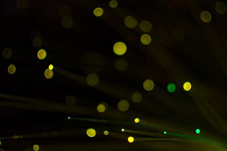Colorful bokeh light celebrate at night, defocus light abstract background.の写真素材