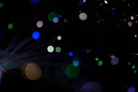 Colorful bokeh light celebrate at night, defocus light abstract background.の写真素材