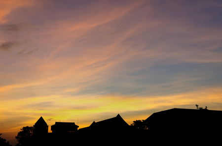 Silhouette of the roof office building at dusk with sky.の写真素材