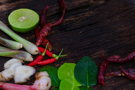 Thai food ingredient for Tom yum on old wooden background.の写真素材