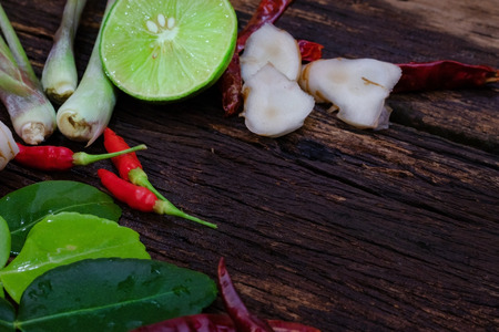Thai food ingredient for Tom yum on old wooden background.の写真素材