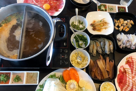 Food in plate prepared for shabu or sukiyaki