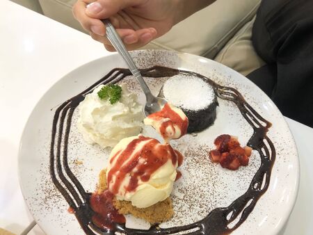 Chocolate lava cake with vanilla ice creamの写真素材